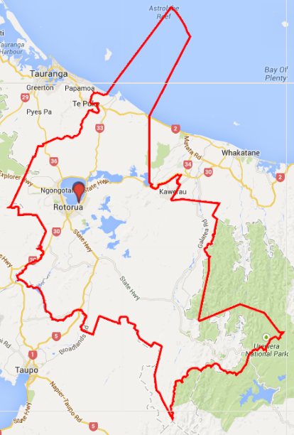Map showing the 2007 Rotorua electorate district outline (red solid line), along with centre of gravity for all party votes (grey), right wing vote (blue) and left wing vote (red), determined by weighted averages of polling place locations from the 2011 election.